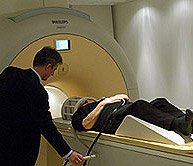 A volunteer about to have his brain scanned